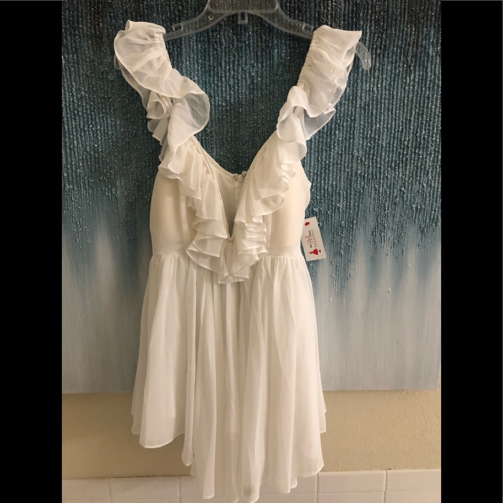 Lined, white romper.